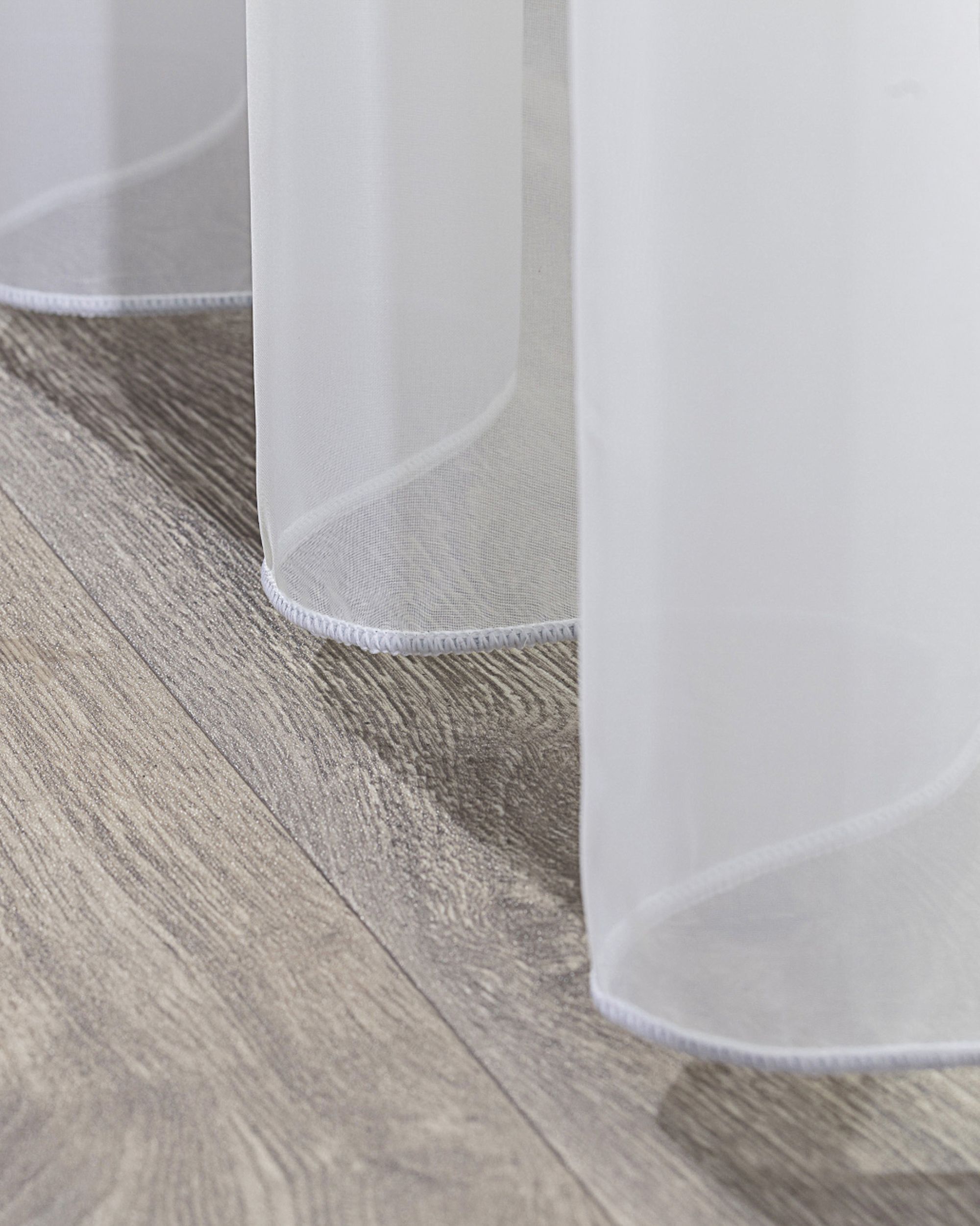 Rideaux en voile à œillets couleur blanc tissu semi-transparent, brillant (hover)