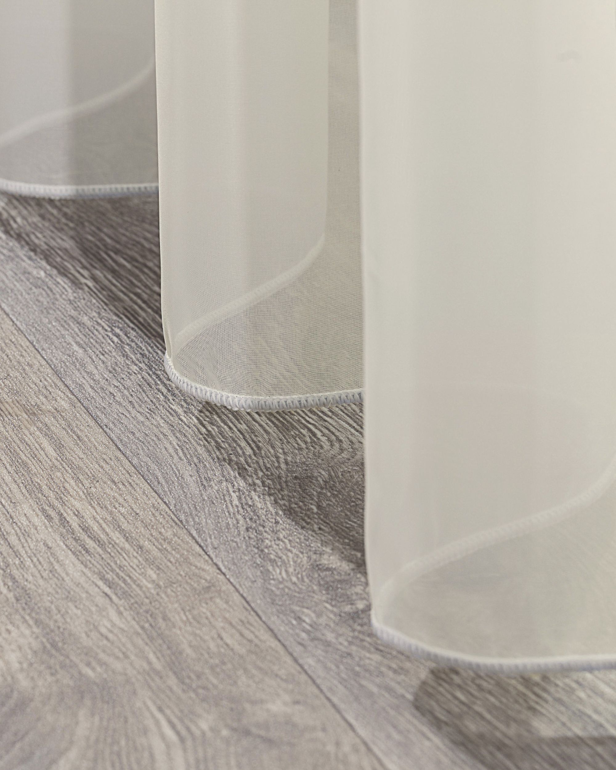 Rideaux en voile à œillets couleur crème tissu semi-transparent, brillant (hover)